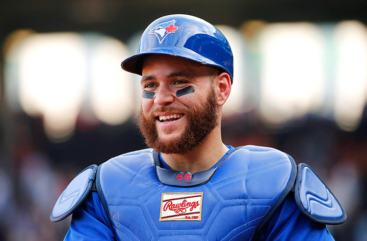 Toronto Blue Jays catcher Russell Martin is all smiles after hitting the winning home run during the 11th inning of their 5-4 win over the Boston Red Sox at Fenway Park on Saturday, June 13, 2015. 