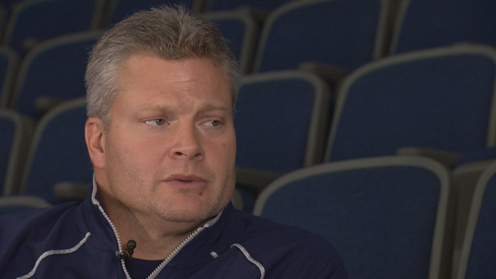 Saskatoon Blades head coach Bob Woods goes one-on-one with Jack Haskins.