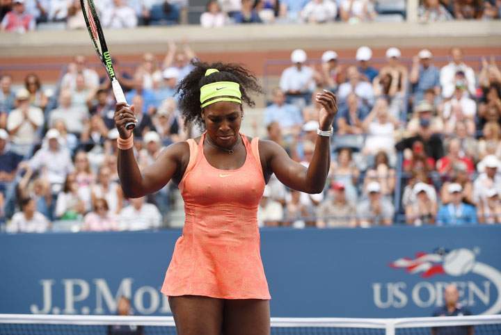 Serena Williams of the US reacts to a point while playing Roberta Vinci of Italy during their US Open 2015 women's singles semifinals match at the USTA Billie Jean King National Center September 11, 2015 in New York.