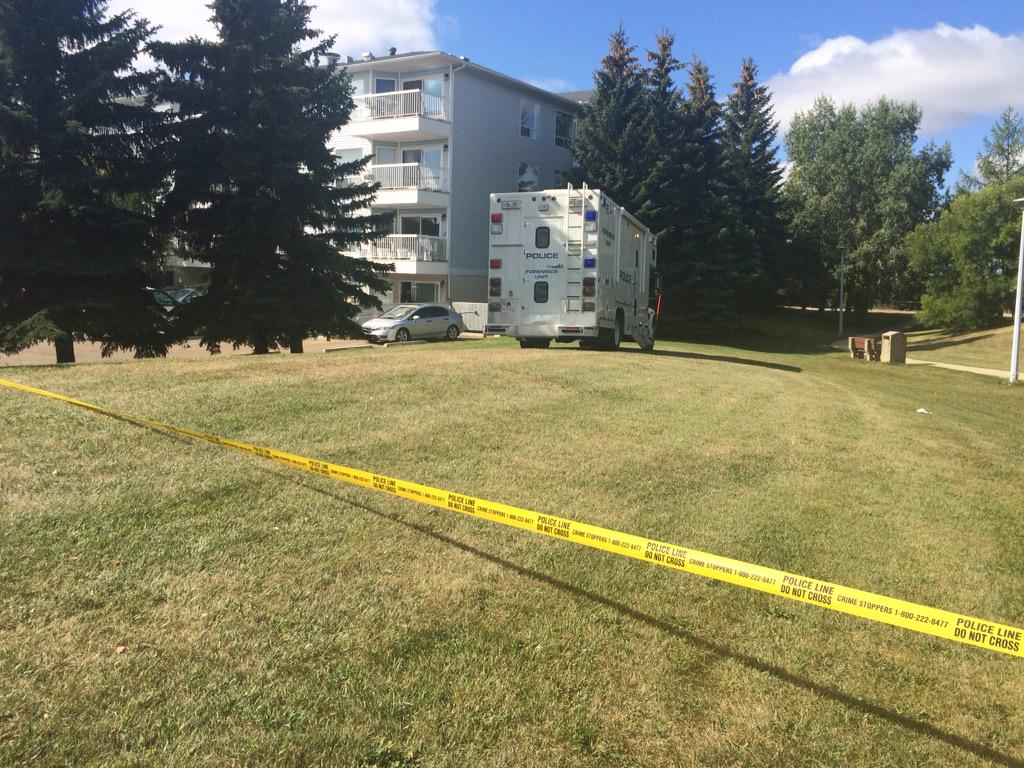 Homicide detectives were called in after a man was shot dead at a condo building near 155th Avenue and 106th Street in northwest Edmonton's Beaumaris neighbourhood. September 3, 2015.