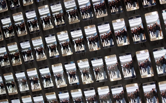 Samsung smartphones are displayed after a press conference.