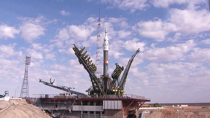 The Soyuz TMA-18M rocket sits atop its launch pad at the Baikonur Cosmodrome in Kazakhstan after rolling out on Monday morning. 