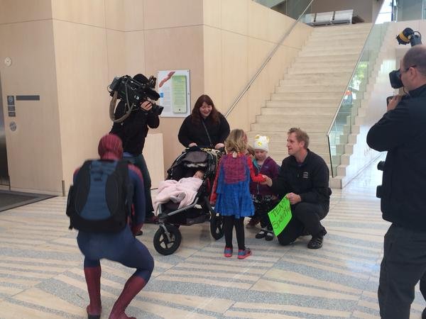 SpiderMable chats with a group of fans at City Hall, Monday, Sept. 28, 2015. 