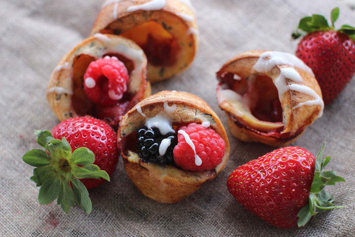 This Sept. 14, 2015 photo shows mini strawberry popovers in Concord, NH. These mini popovers are so tiny and airy that you can have a couple of them for well under 100 calories.