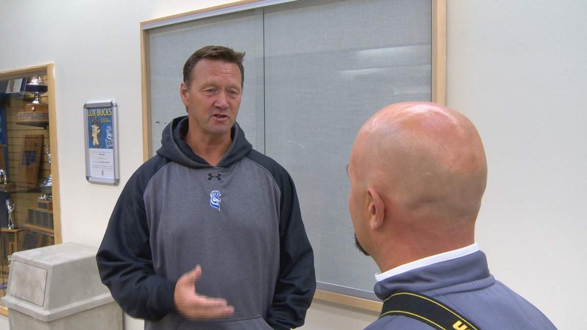 U of L rugby coach Richard Suggitt talks with Pronghorns athletics staff. 