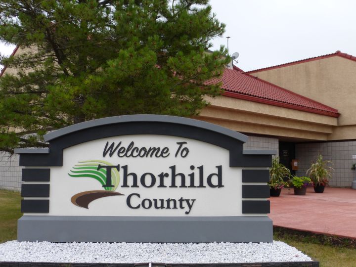 A file photo of a sign welcoming people to Thorhild County, Alta.