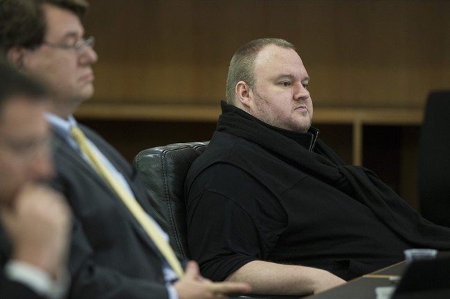 n this Sept. 21, 2015 file photo, Kim Dotcom sits in the Auckland District Court during an extradition hearing in Auckland, New Zealand.