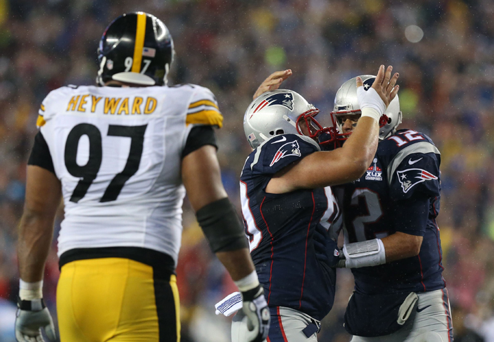 New England Quarterback Tom Brady  celebrates 2nd touchdown with David Andrews.