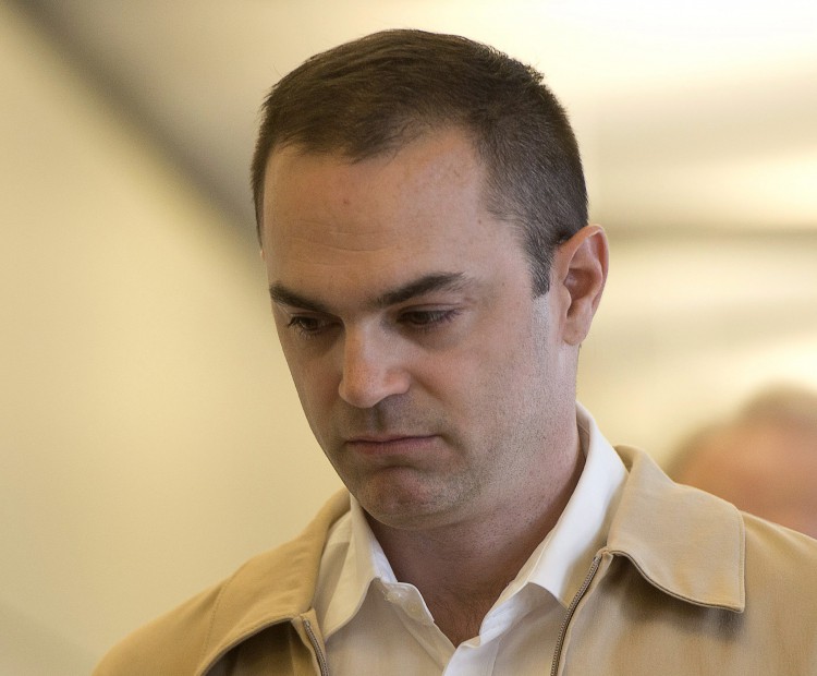 Guy Turcotte arrives at the courthouse Monday, September 28, 2015 in Saint Jerome, Que.. Turcotte is being retried for the murder of his two children.