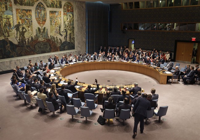 In this July 20, 2015 file photo, members of the Security Council vote at United Nations headquarters. Sweden's U.N. ambassador, who is also the council president, is urging member countries to look beyond their interests and work together in 2017.