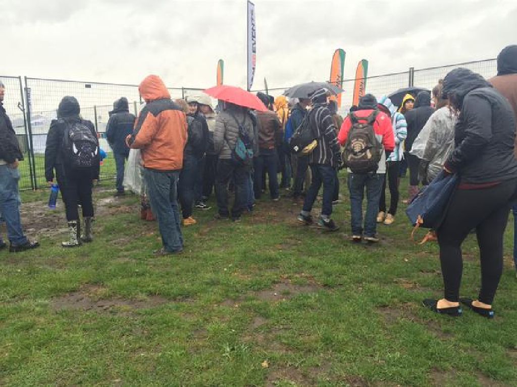 People waiting for the gates to open at X-Fest at Fort Calgary Saturday morning. 