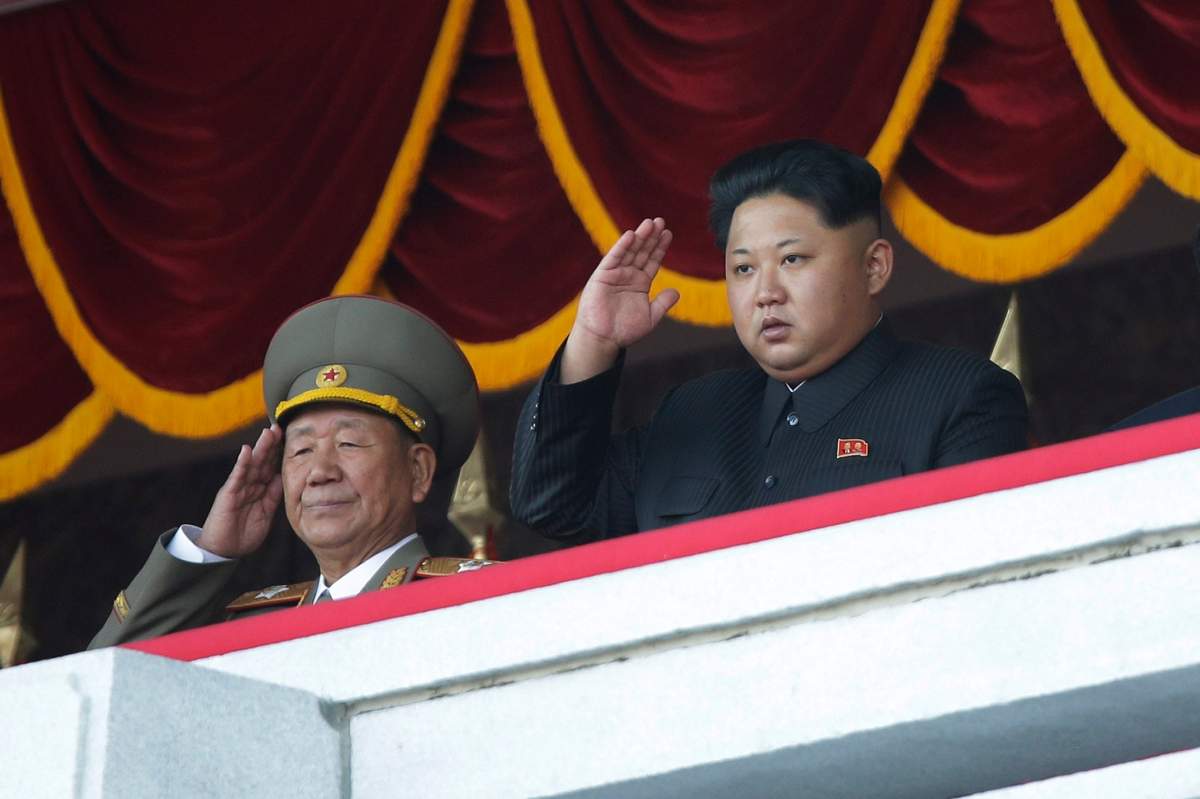 North Korean leader Kim Jong Un, right, salutes at a parade in Pyongyang, North Korea, Saturday, Oct. 10, 2015. North Korean leader Kim Jong Un declared Saturday that his country was ready to stand up to any threat posed by the United States as he spoke at a lavish military parade to mark the 70th anniversary of the North’s ruling party and trumpet his third-generation leadership. ()