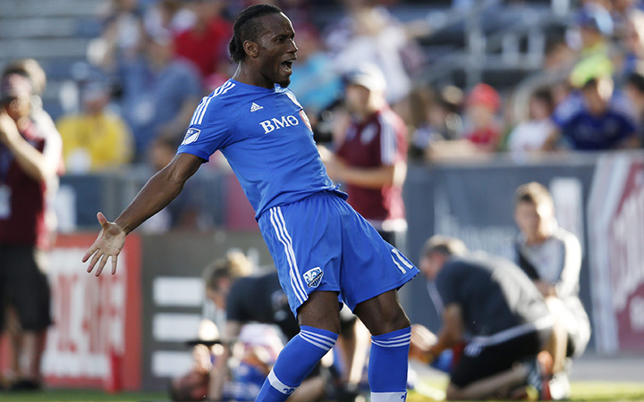 Montreal Impact forward Didier Drogba celebrates after making penalty kick against Colorado Rapids in the first half of an MLS soccer match in Commerce City, Colo., Saturday, Oct. 10, 2015.
