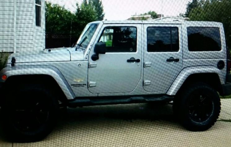 Police are searching for the stolen 2013 silver Jeep Wrangler involved in a hit-and-run collision in northeast Edmonton Sunday, Oct. 18, 2015.