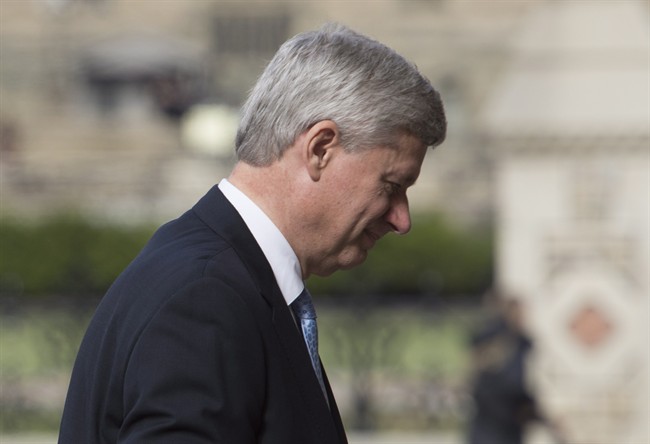 Outgoing prime minister Stephen Harper arrives at his Langevin office in Ottawa, Wednesday, Oct. 21, 2015.