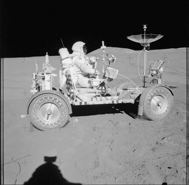 Driving around on the lunar buggy on the Apollo 15 mission.