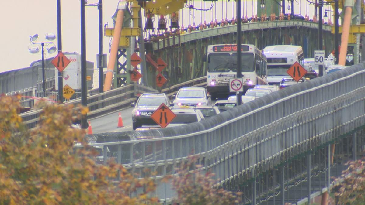 A Halifax Transit bus drives over one of the transition plates on the Angus L. Macdonald Bridge on Thursday.