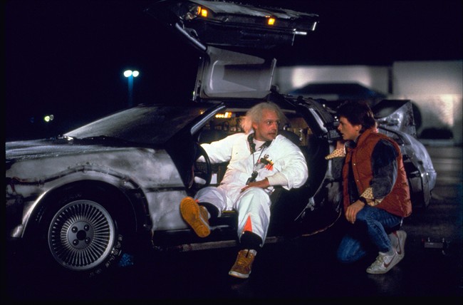 Christopher Lloyd, left, as Dr. Emmett Brown, and Michael J. Fox as Marty McFly in "Back to the Future.".