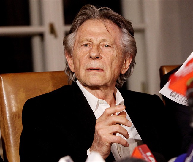 FILE - In this file photo, filmmaker Roman Polanski tells reporters he can "breath with relief" after a Polish judge ruled that the law forbids his extradition to the U.S., where in 1977 he pleaded guilty to having sex with a minor, in Krakow, Poland, Friday, Oct. 30, 2015. An attorney for a woman who was sexually assaulted by Polanski when she was 13 praised the refusal Friday of a Polish judge to send the Oscar-winning director to Los Angeles for sentencing. Lawyer Lawrence Silver, who represents victim Samantha Geimer, also reiterated his client wants the long-running case against Polanski to end. (AP Photo/Jarek Praszkiewicz, File).