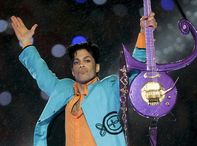 Prince performs during the halftime show at Super Bowl XLI in Miami in 2007.