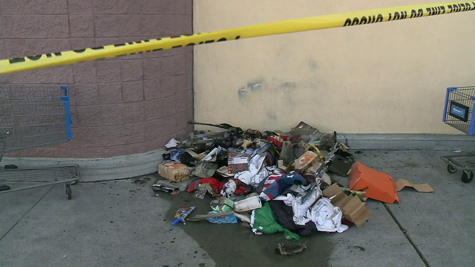Caught on camera: Arsonist sets Halloween costumes in Walmart on fire - image