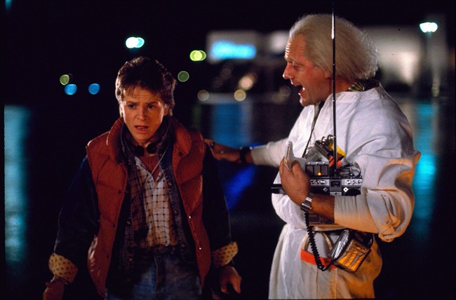Michael J. Fox, left, as Marty McFly and Christopher Lloyd as Dr. Emmett Brown appear in a scene from the 1985 film, ‘Back to the Future’, in this undated handout photo.