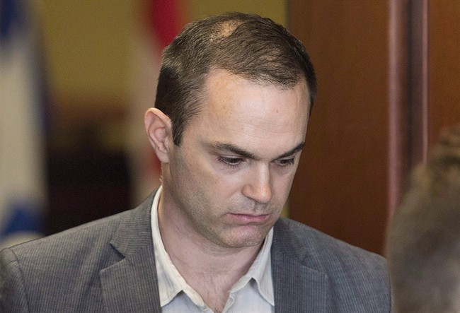 Guy Turcotte leaves the courthouse in Saint-Jerome, Que., Monday, September 14, 2015. An emergency technician has testified that Guy Turcotte told hospital officials a day after his children were stabbed to death that he wanted to die and that what he had done was terrible. 