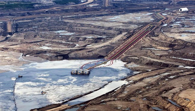 An oil sands facility seen from a helicopter near Fort McMurray, Alta., on July 10, 2012..