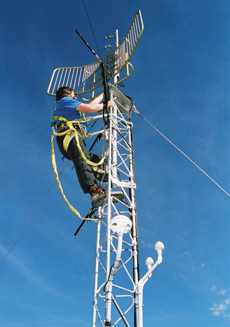 A technician installs the antennae that receives earthquake data from remote stations in Canada in a handout photo. On Thursday, drills in British Columbia and Quebec will provide people with the opportunity to learn how to be safer during earthquakes.