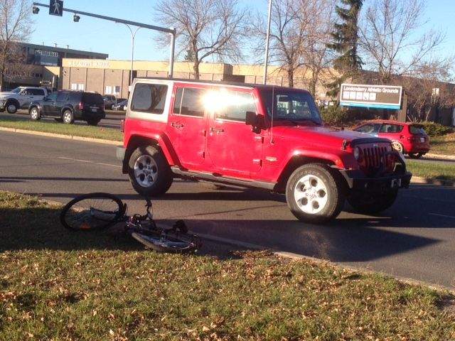 A cyclist was taken to hospital after being hit by a vehicle in north Edmonton, Thursday, Oct. 15, 2015. 