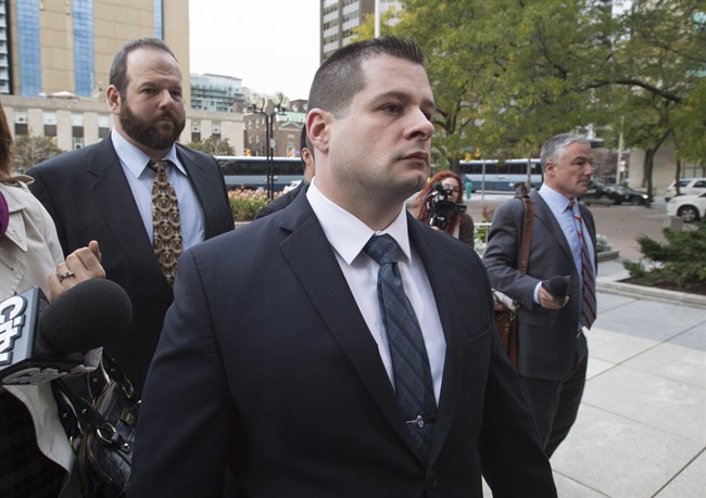 Const. James Forcillo, the police officer charged in the death of Sammy Yatim, arrives at court in Toronto on Tuesday, October 13, 2015.