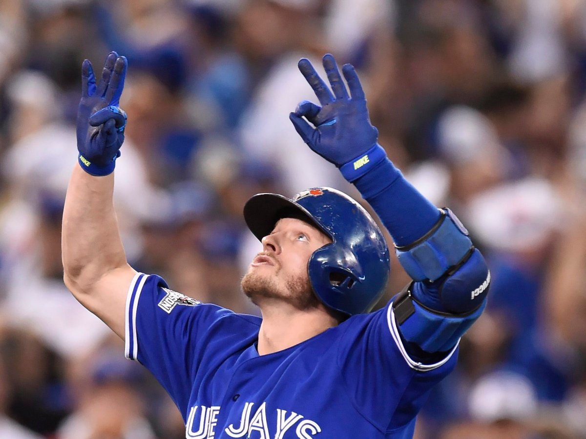 Toronto Blue Jays' Josh Donaldson reacts as he crosses the plate after hitting a two-run home run.