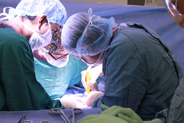 In this file photo, Dr,  Meterissian is seen using the the wand-like Intrabeam® device during surgery. Montreal, Oct. 30, 2015.
