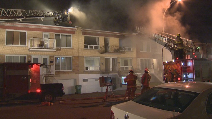 A fire destroyed a triplex in Hochelaga, leaving two families homeless. Monday, October 26, 2015.