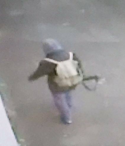 Suspect carrying an umbrella was initially believed to be carrying a firearm.