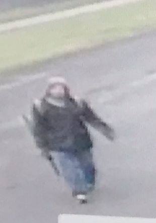 Suspect carrying an umbrella was initially believed to be carrying a firearm.