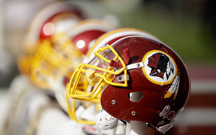 Washington Redskins helmets on the sideline during their game against the San Francisco 49ers at Levi's Stadium on November 23, 2014 in Santa Clara, California. 