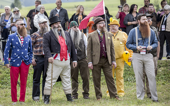 Contestants of the World Beard And Mustache Championships pose for a picture during the opening ceremony of the Championships 2015 on October 3, 2015 in Leogang, Austria.