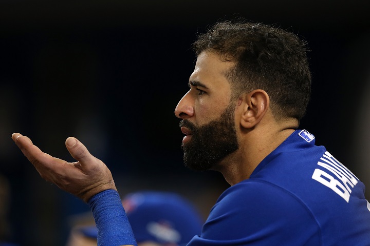  Jose Bautista #19 of the Toronto Blue Jays looks on from the bench in the 14th inning against the Texas Rangers during game two of the American League Division Series at Rogers Centre on October 9, 2015 in Toronto, Canada. (Photo by Vaughn Ridley/Getty Images).
