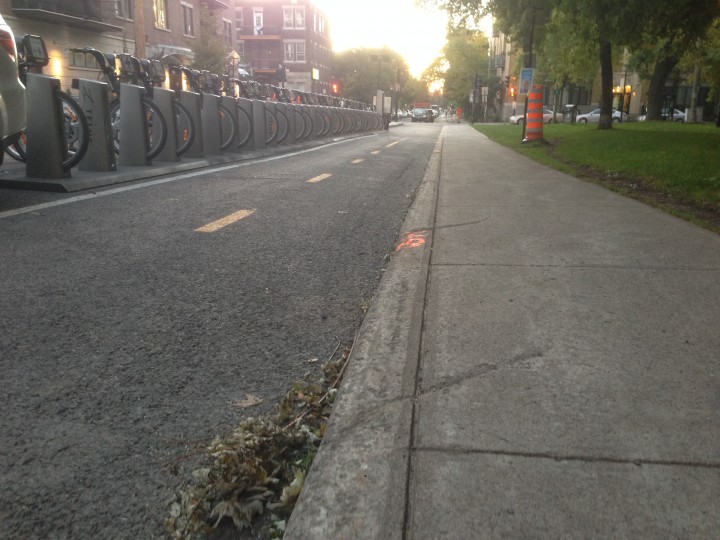 The sidewalk along Brébeuf Street in the Plateau will soon be replaced by bike paths and car parking, Monday, October 5, 2015.