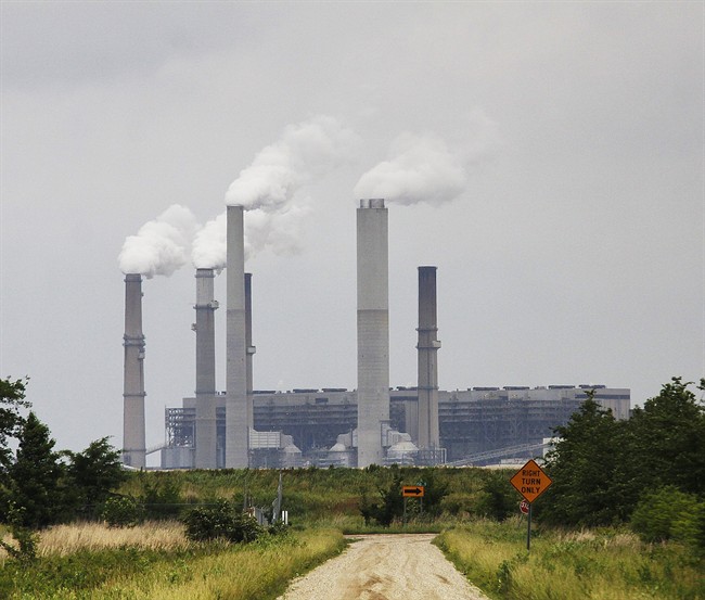 FILE - In this Monday, June 2, 2014, file photo, Duke Energy's Gibson Generating Station is seen in Gibson County, Ind. 