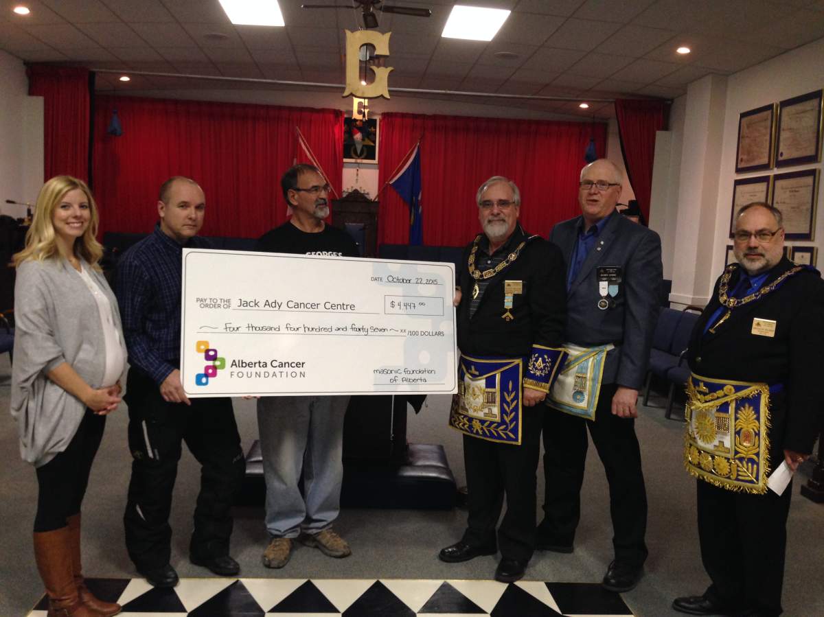 Members of the Masonic Lodge and representatives from the Jack Ady Cancer Centre.