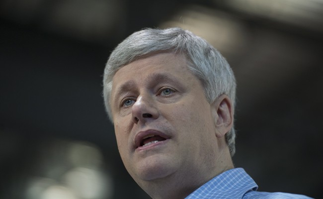Conservative leader Stephen Harper attends a campaign event in Quebec City on Friday, Oct. 16, 2015.