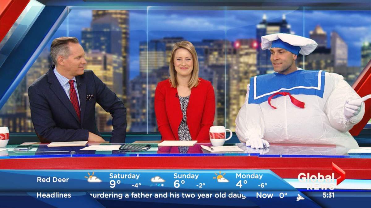 Global Calgary’s Scott Fee (left) and Amber Schinkel (middle) discuss Halloween with Meteorologist Jordan Witzel on Friday, Oct. 30, 2015.