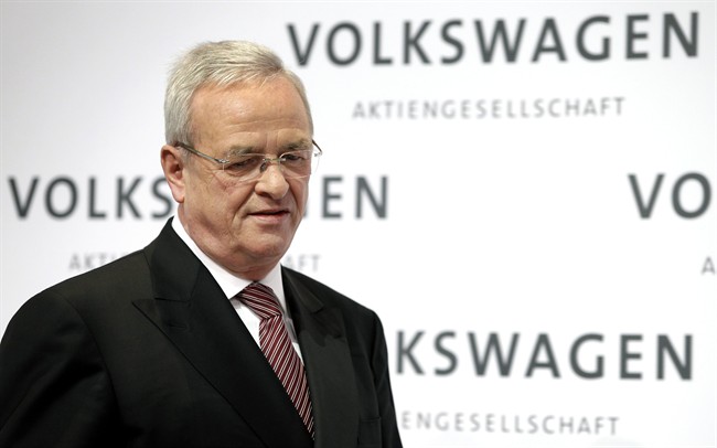 In this March 12, 2015 file picture then Volkswagen CEO Martin Winterkorn looks down as he arrives for the company's annual press conference in Berlin, Germany. Porsche Automobil Holding SE said Saturday, Oct. 17, 2015, that Winterkorn will depart as CEO and executive board member by the end of the month.
