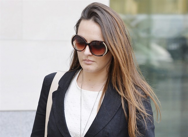 Meerkat expert Caroline Westlake leaves Westminster Magistrates Court after being sentenced to 80 hours community service for glassing a love-rival, in London, Wednesday Oct. 14, 2015. The High Court said on Tuesday Feb. 23, 2016 that magistrates had applied the wrong legal test for recklessness and quashed he conviction.