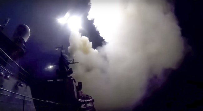 In this photo made from the footage taken from Russian Defense Ministry official web site, Wednesday, Oct. 7, 2015, a Russian navy ship launches a cruise missile in the Caspian Sea. Russia's Defense Minister Sergei Shoigu said four Russian navy ships in the Caspian launched 26 cruise missiles at Islamic State targets in Syria.().