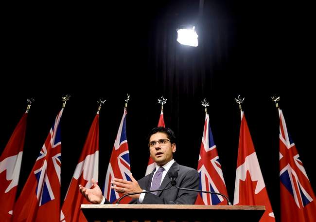 Yasir Naqvi, Ontario Minister of Community Safety and Correctional Services, explains a draft regulation for public input that would prohibit the random and arbitrary collection of identifying information by police, referred to as carding or street checks at Queen's Park in Toronto on Wednesday, October 28, 2015. 