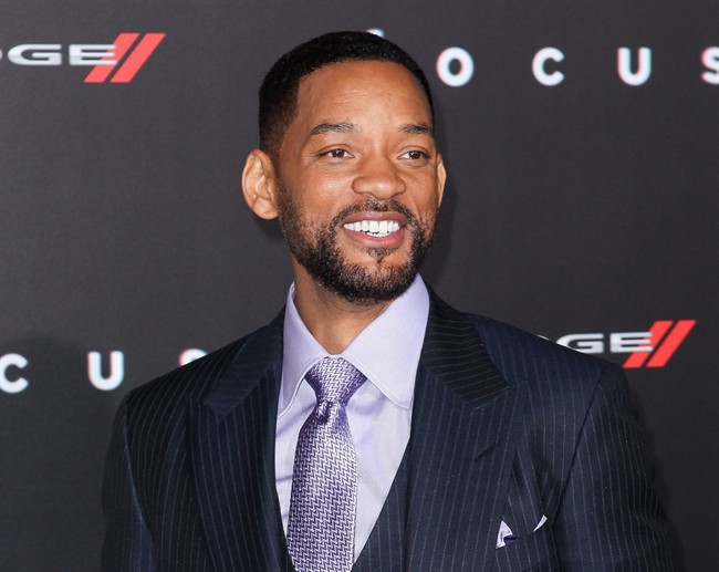 FILE - In this Feb. 24, 2015 file photo, Will Smith arrives at the world premiere of "Focus" in Los Angeles. Smith will join the Colombian band Bomba Estereo for their remix of “Fiesta” in Las Vegas at the Latin Grammy Awards on Nov. 19.
