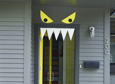 Quickly make an amusing Halloween front door with craft foam.